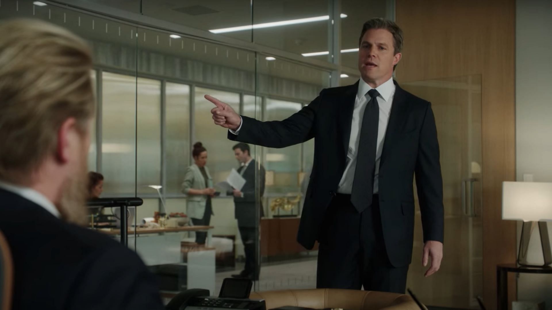 Ted and Stuart in conflict (Image via YouTube/Suits official)